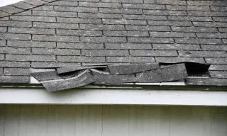 Storm Damage or Just Old Shingles Up There?